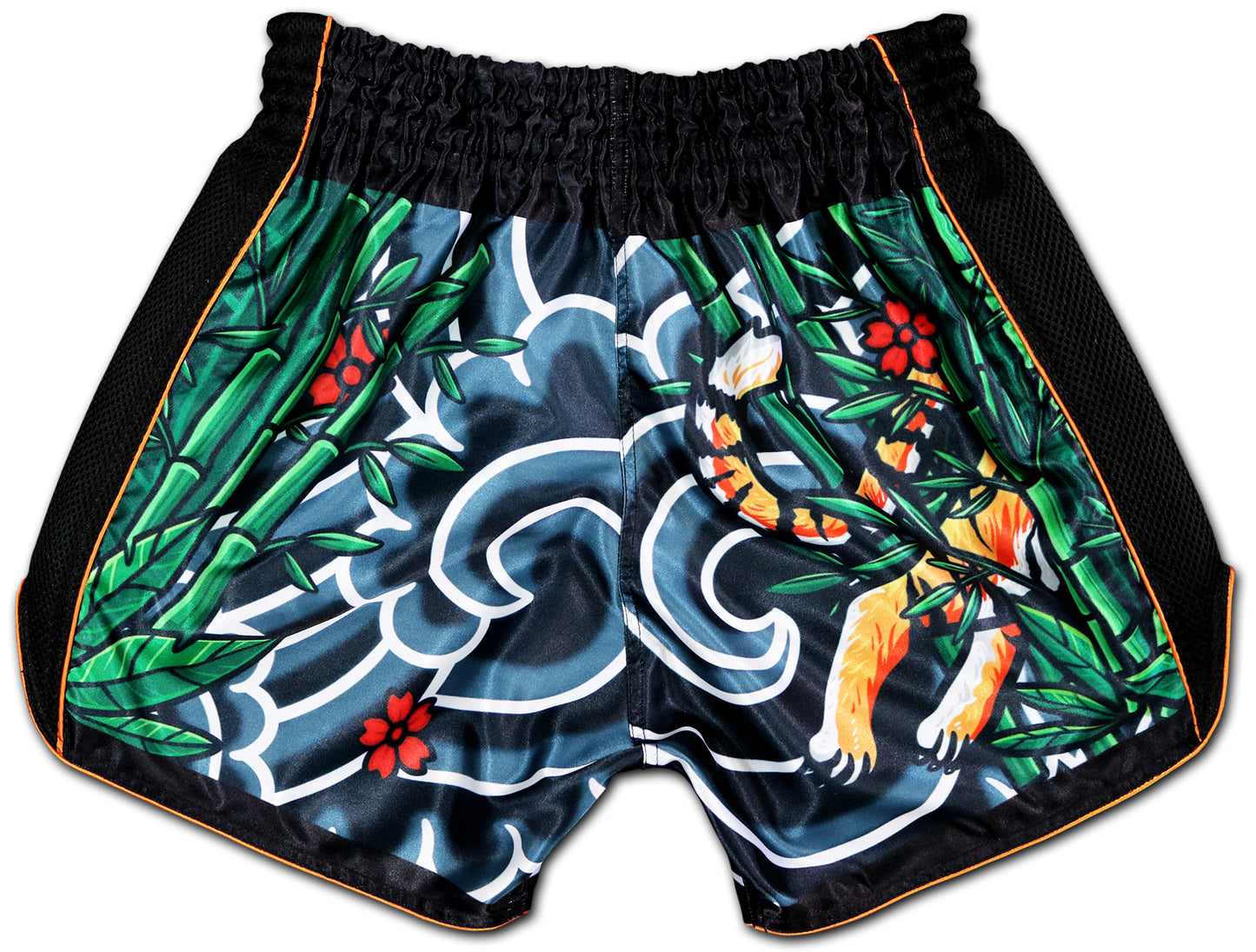 Back view of Muay Thai Shorts featuring Japanese Irezumi tiger tail, bamboo, red flowers, black mesh side panels, and orange piping β handmade in Thailand