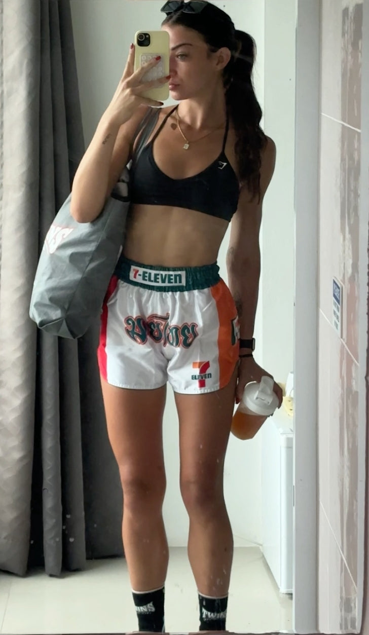 Muay Thai model is wearing the iconic 7-eleven Muay Thai shorts