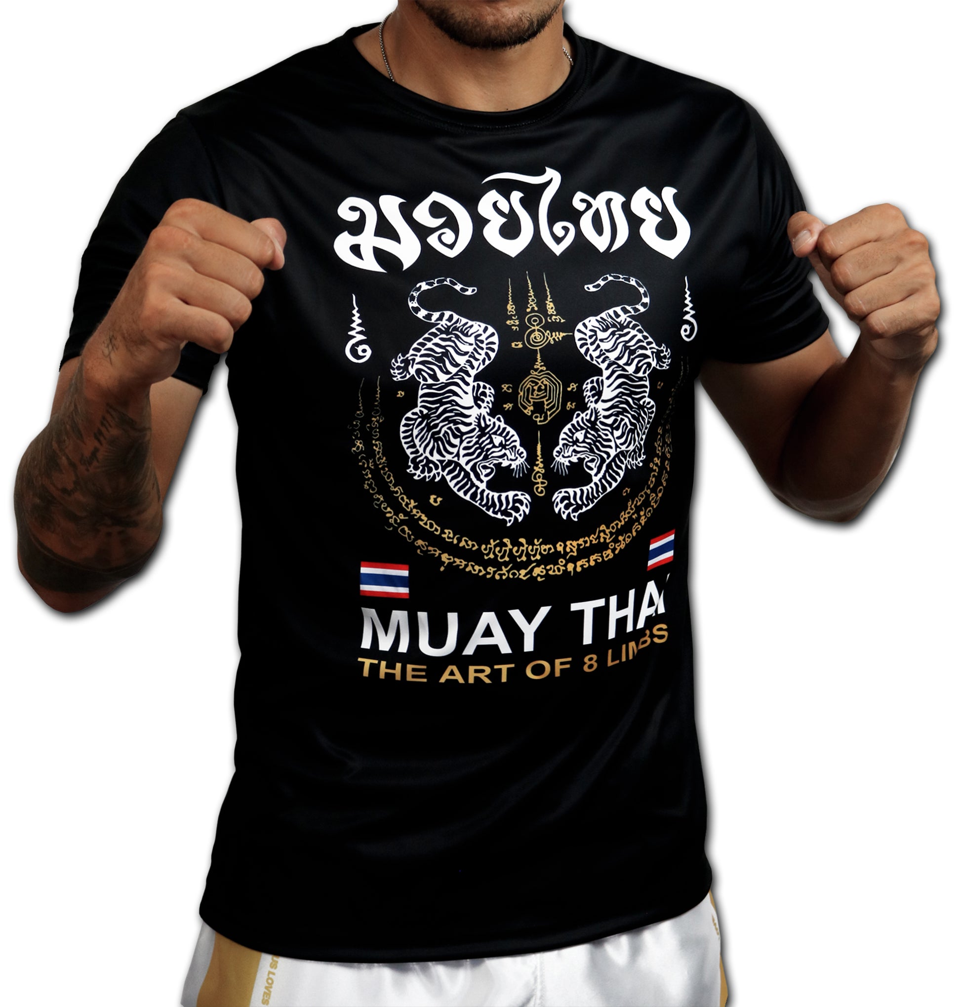 Tiger Sak Yant Muay Thai t-shirt worn by model, front view showing twin tiger Sak Yant design in fighting stance