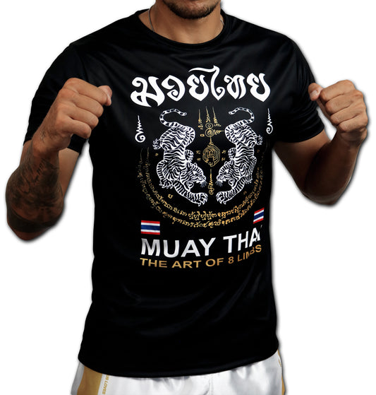 Tiger Sak Yant Muay Thai t-shirt worn by model, front view showing twin tiger Sak Yant design in fighting stance