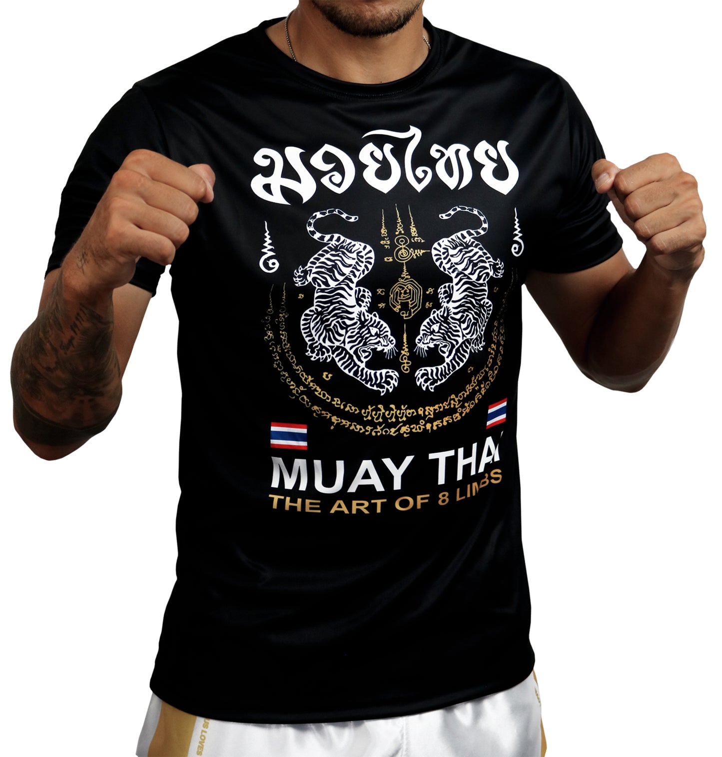 Tiger Sak Yant Muay Thai t-shirt worn by model, front view showing twin tiger Sak Yant design in fighting stance