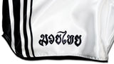 white muay thai boxing shorts with black stripes