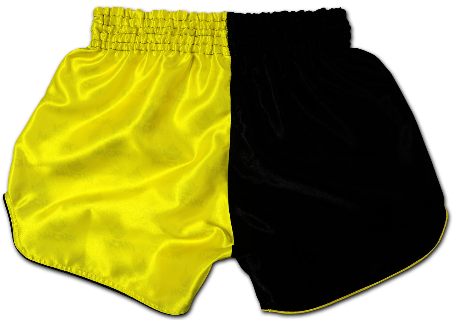 Back view of the YAKSHA Luk Krung two-tone Muay Thai Shorts in black and yellow premium satin handmade in Hua Hin Thailand