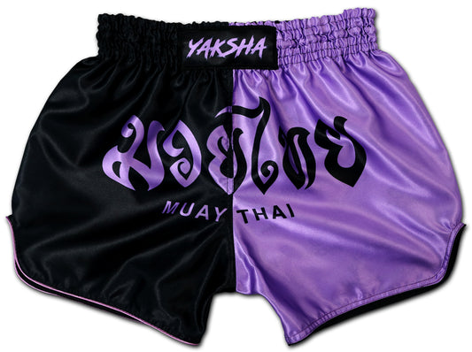 YAKSHA Luk Krung Muay Thai Shorts Black Lavender – split design with Thai script meaning Muay Thai, YAKSHA logo on waistband, handmade in Thailand