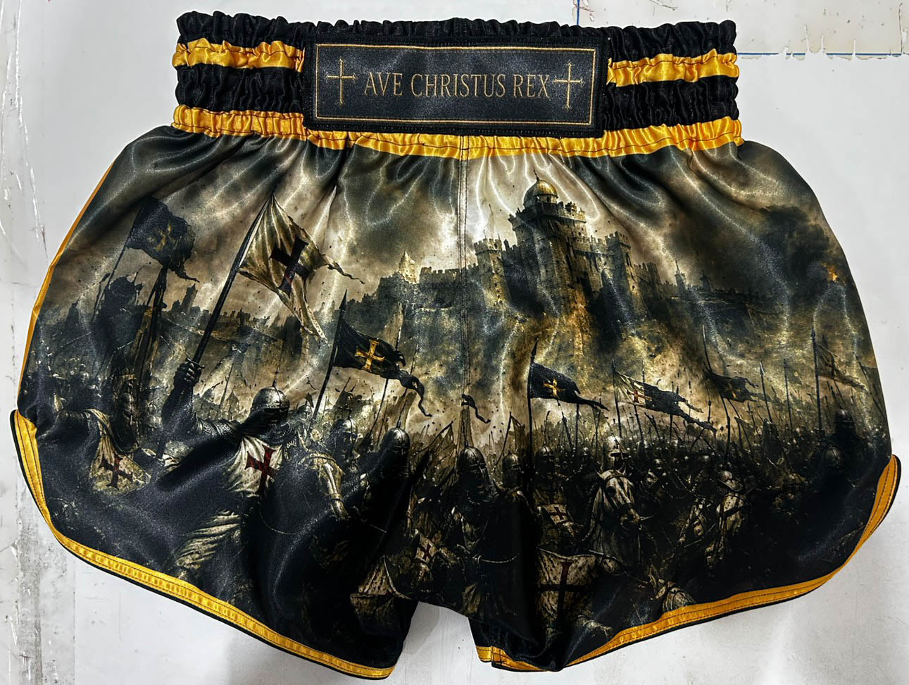 epic full color print on a custom made muay thai shorts showing a castle and crusaders