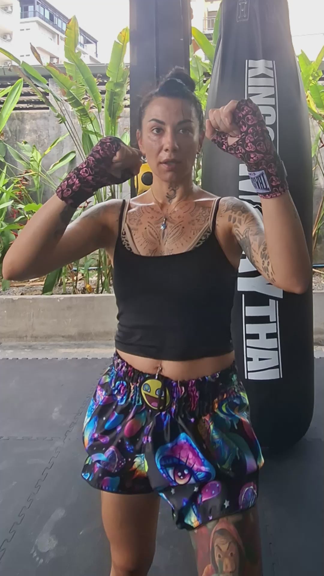 
Muay Thai Fighter is wearing the Magic Mushrooms Muay Thai shorts while Muay Thai training, shadow boxing, punching and kicking in the gym