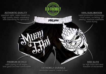 YAKSHA Yin Yang black fightshorts infographic showing premium satin quality, sublimation print, side slits and eco friendly production