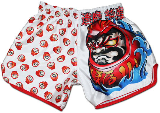 Front view of white DARUMA satin fight shorts with red Japanese daruma doll pattern and bold daruma face graphic