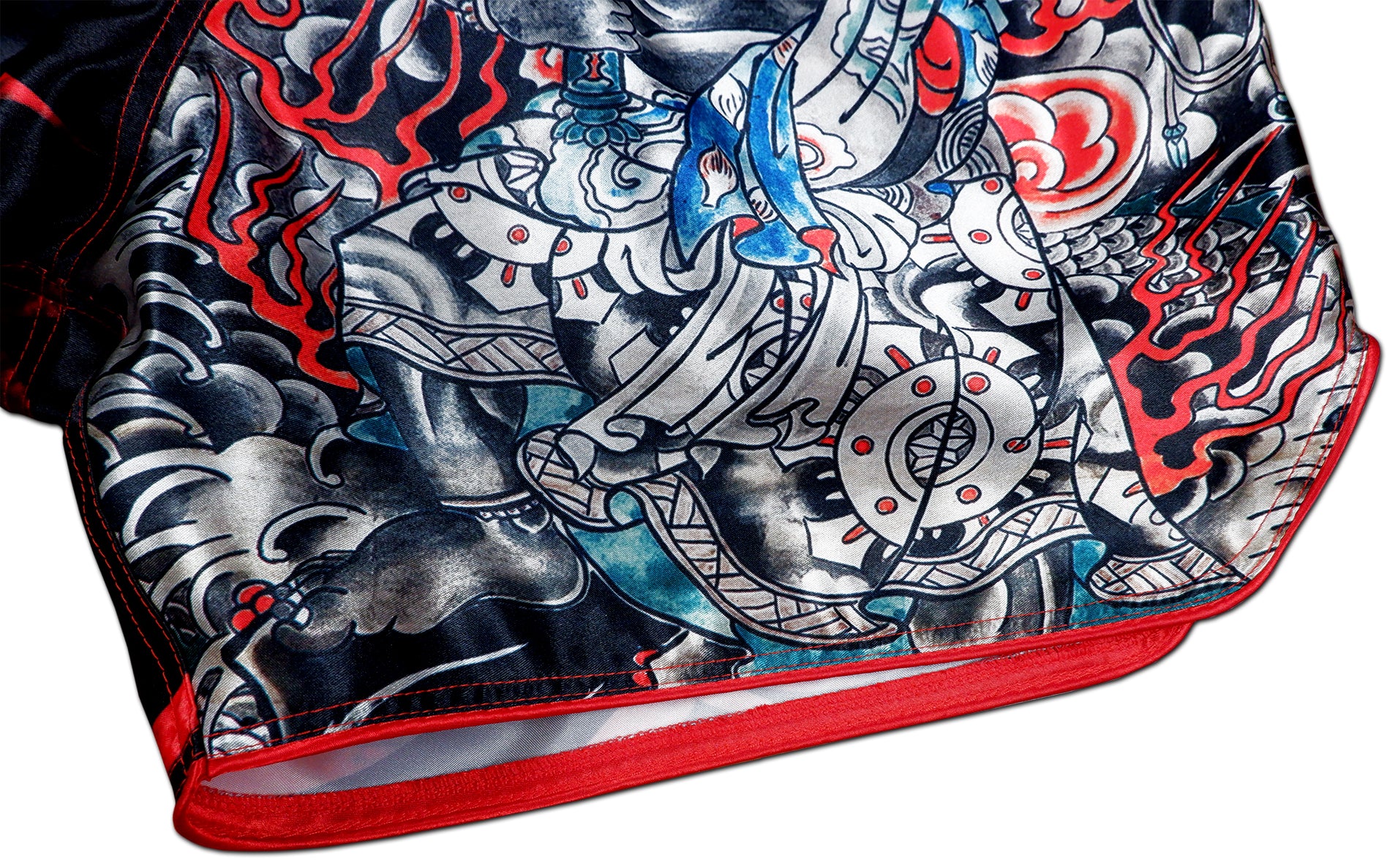 Close up of satin fabric and detailed dragon artwork on Dragon Master Mixed Martial Arts Shorts