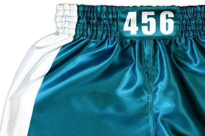 Close up of the 456 player number patch on the teal green satin waistband of the Muay Thai training shorts
