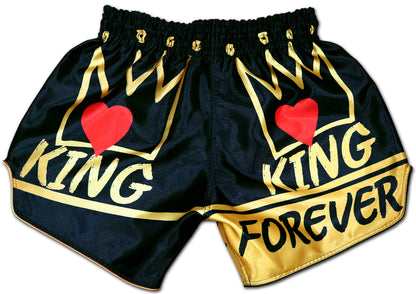 Back view of black KING Forever Muay Thai Boxing Shorts with bold gold crown design and KING FOREVER lettering