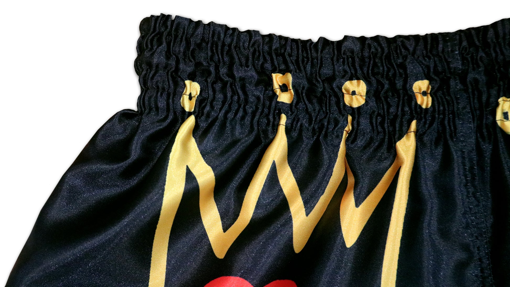 Close up of elastic waistband and golden crown brushstroke print on KING Forever Muay Thai Boxing Shorts