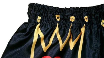 Close up of elastic waistband and golden crown brushstroke print on KING Forever Muay Thai Boxing Shorts