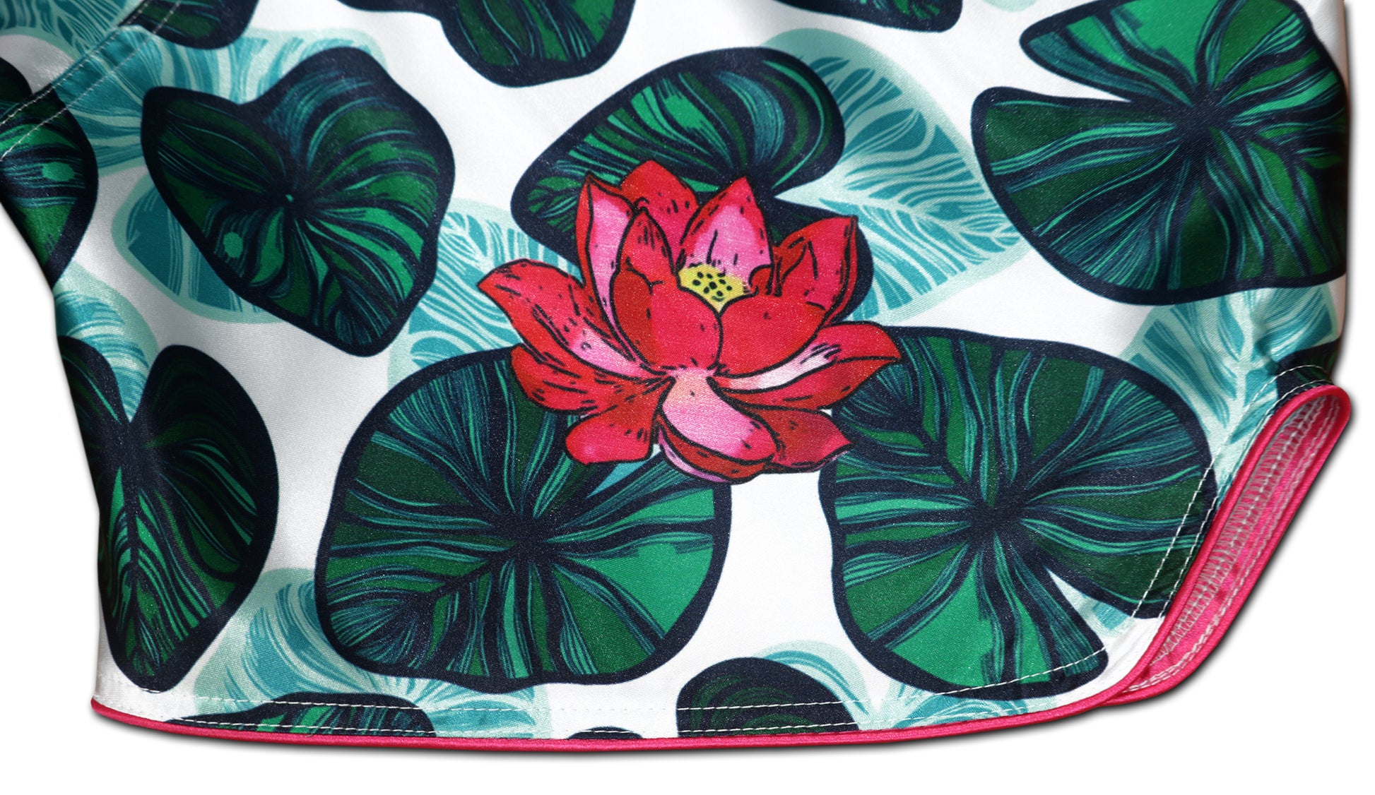 Close up of pink lotus flower artwork and satin fabric on Lotus Flower Muay Thai Shorts