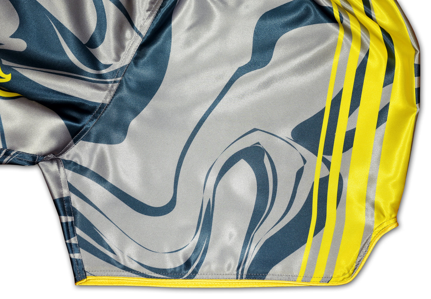 OOWEE Muay Thai Shorts detail showing yellow stripes and smoke liquid design on gray premium satin