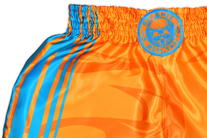 Close up picture of the OOWEE Muay Thai Shorts showing blue stripes and smoke liquid design on vibrant orange premium satin