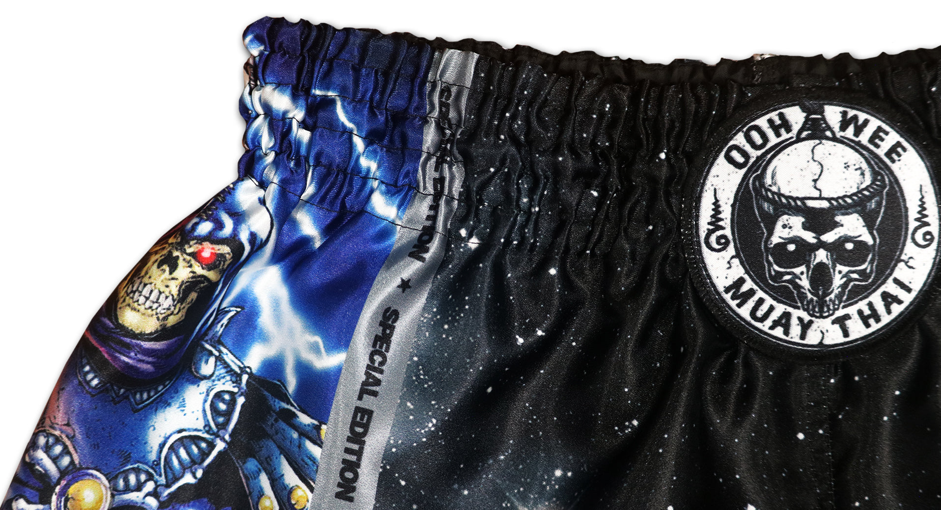 Close-up of elastic waistband and glossy satin fabric on OOWEE Masters of the Universe Muay Thai Shorts