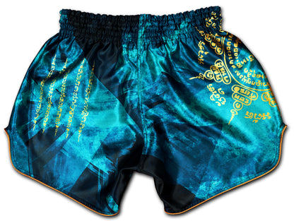 Back view of Phaya Naga aqua blue Muay Thai Fight Shorts with gold Suea Khao Kham tiger claw Sak Yant and sacred Khmer script on premium satin