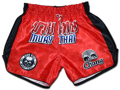 Front view of Red Corner Muay Thai Boxing Shorts with black side panels and traditional Thai fightwear design