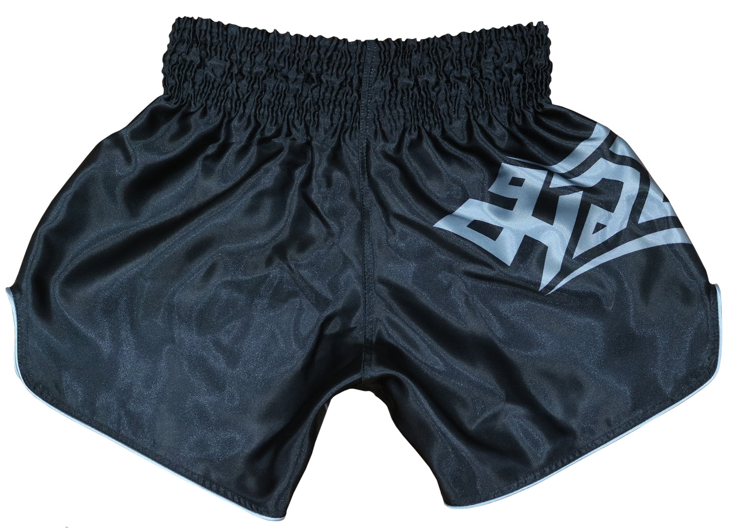 Back view of Samurai Tribal kickboxing shorts in black satin with bold silver gray tribal Muay Thai logo on side panel