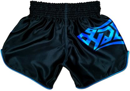 Back view of black satin Thai fightwear shorts with electric blue tribal lettering and contrast blue piping along the hem