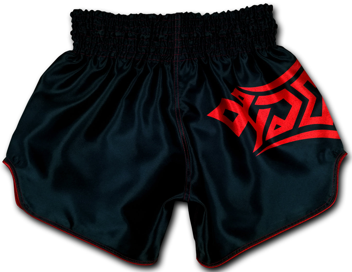 Back view of black satin Muay Thai boxing shorts with blood red tribal lettering and contrast red piping along the hem