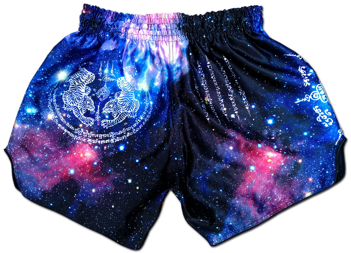 Universe Galaxy kickboxing shorts back view, Twin Tiger Yantra and Hah Taew sacred script on deep space galaxy print