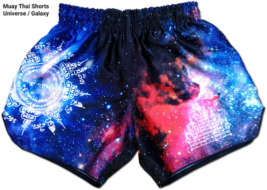 Universe Galaxy fight shorts front view, deep blue galaxy print with red nebula and sacred Sak Yant symbols on premium satin